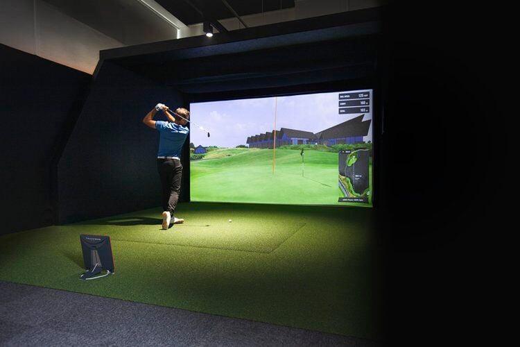 Player+swinging+in+SIM_72+dpi