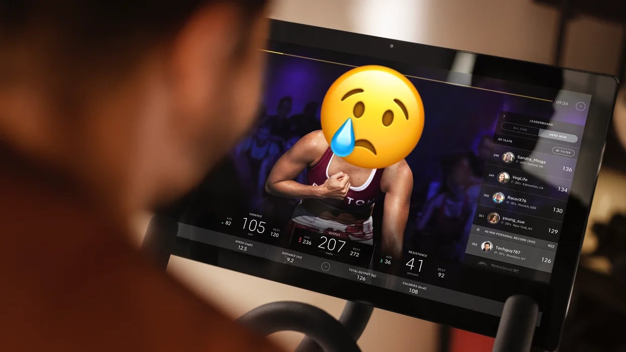 an-image-of-a-peloton-monitor-with-a-sad-face-emoji